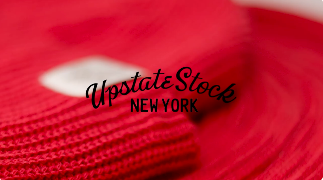 Load video: Video of how one of the Upstate Stock red beanies is made