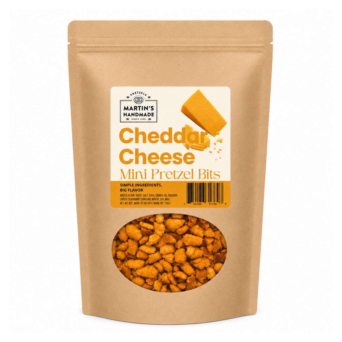 A stand-up kraft paper pouch of Martin's Handmade Cheddar Cheese Mini Pretzel Bits, featuring a clear window at the bottom showing the golden-brown pretzel pieces inside.
