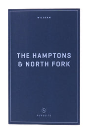 Blue book titled 'The Hamptons & North Fork' by Wildsam on a white background