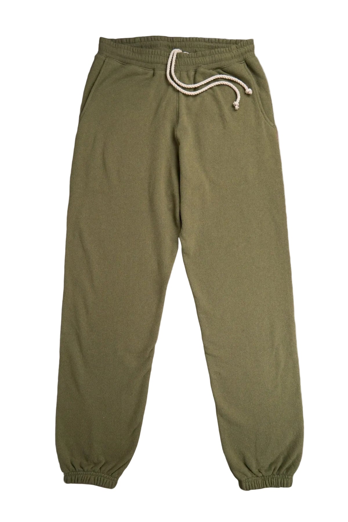 Green sweatpants with a drawstring on a white background
